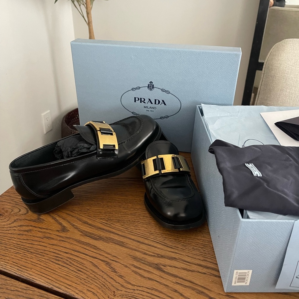Prada loafers gold buckle